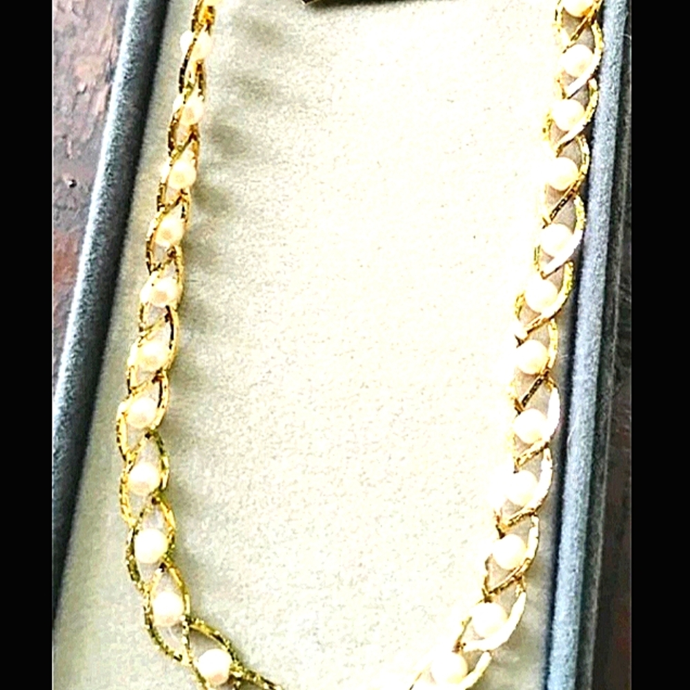 MCM Joanne Jewels Elegant Gold and Cream Necklace with Classic Chain Design